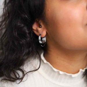 Model wearing Gradient Threader earrings