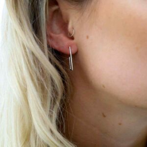 Blonde Model Wearing Sterling Silver Staple Studs