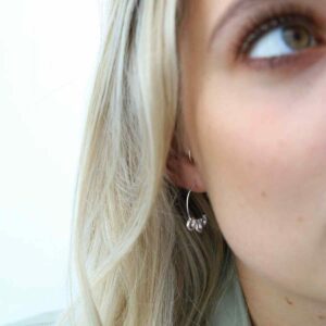 Blonde Model Wearing Sterling Silver Lucky Horseshoe Hoops