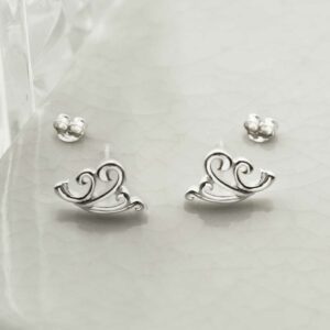 silver swirling pattern studs on tile