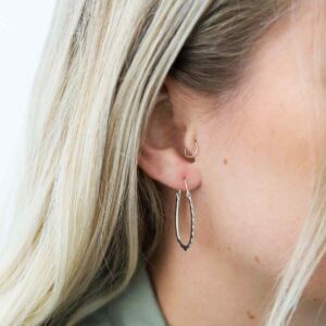 Blonde Model Wearing Sterling Silver Shark Bite Hoops