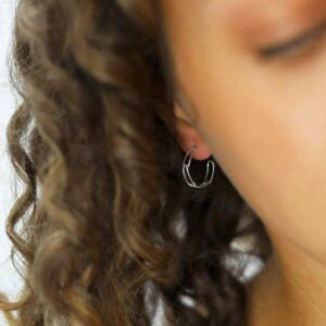 silver solid paperclip links rounded hoop studs on model