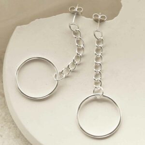 silver hanging hoop on curb chain earrings strewn