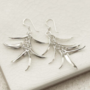 silver spiky dangling leaves earrings strewn