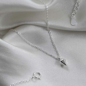 silver 3d diamond shaped pendant on chain with catch and extension chain