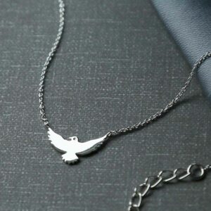 silver bird necklace with chain attached to wings