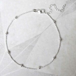 silver chain anklet with tiny balls laid in circle