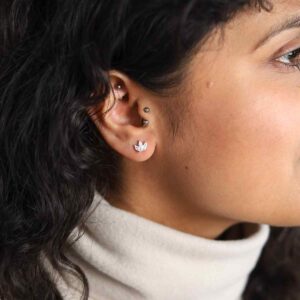 Model wearing cubic zirconia crown stud earrings