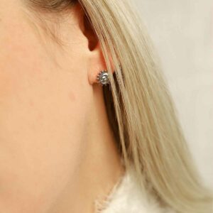 Sun and Moon Stud Earrings on blonde model