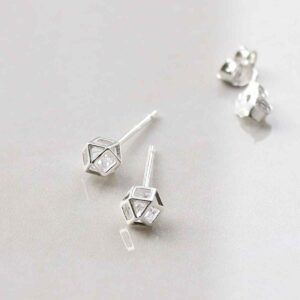 silver 3d polygonal studs with cubic zirconia gemstone in centre in shade