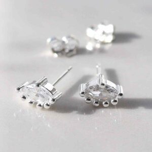 silver eye shaped cubic zirconia set studs taken apart in shade