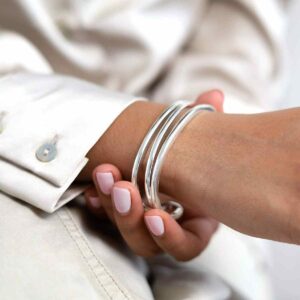 model wearing sterling silver wrap cuff bangle