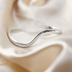 silver wave design cuff bangle on silk