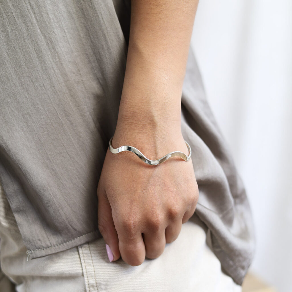 model wears sterling new silver ocean cuff bangle