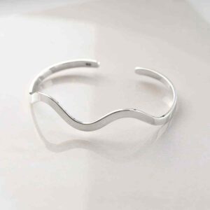 sterling silver ocean cuff bangle on tile