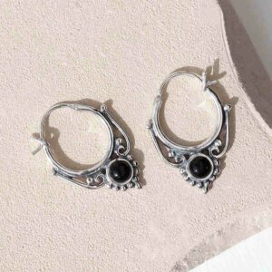 sterling silver onyx drop hoop earrings ceramic background