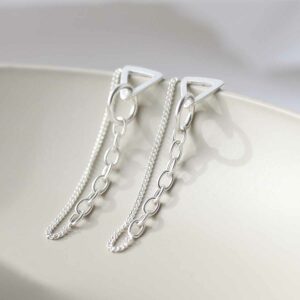 Sterling Silver Unity Chain Stud Earrings on bowl