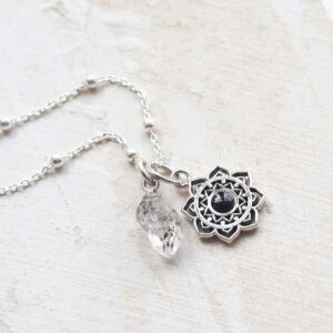 Onyx moroccan flower necklace ceramic and paint background