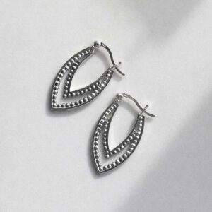 Sterling Silver Beaded Leaf Hoop Earrings on ceramic background