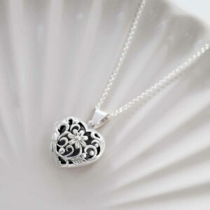 Sterling Silver Daisy Locket on ceramic background