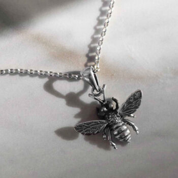 Sterling Silver Oxidised Honey Bee Necklace on marble