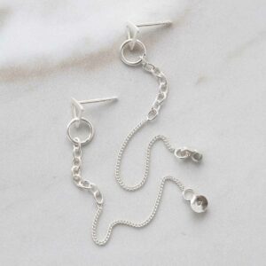 Sterling Silver Unity Chain Stud Earrings on marble background