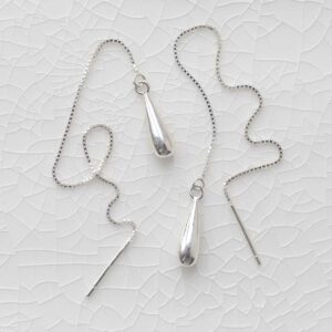 Sterling Silver Teardrop Threader Earrings on ceramic background