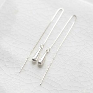 Sterling Silver Teardrop Threader Earrings on ceramic background