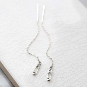 Sterling Silver Safety Pin Threader Earrings on ceramic background