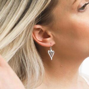 Sterling Silver Mother of Pearl Arrow Earrings on Model