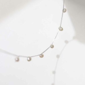 Sterling Silver String of Pearls Necklace with reflection