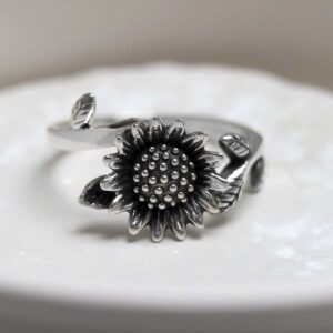 Sterling Silver Adjustable Oxidised Sunflower Ring in jewellery dish