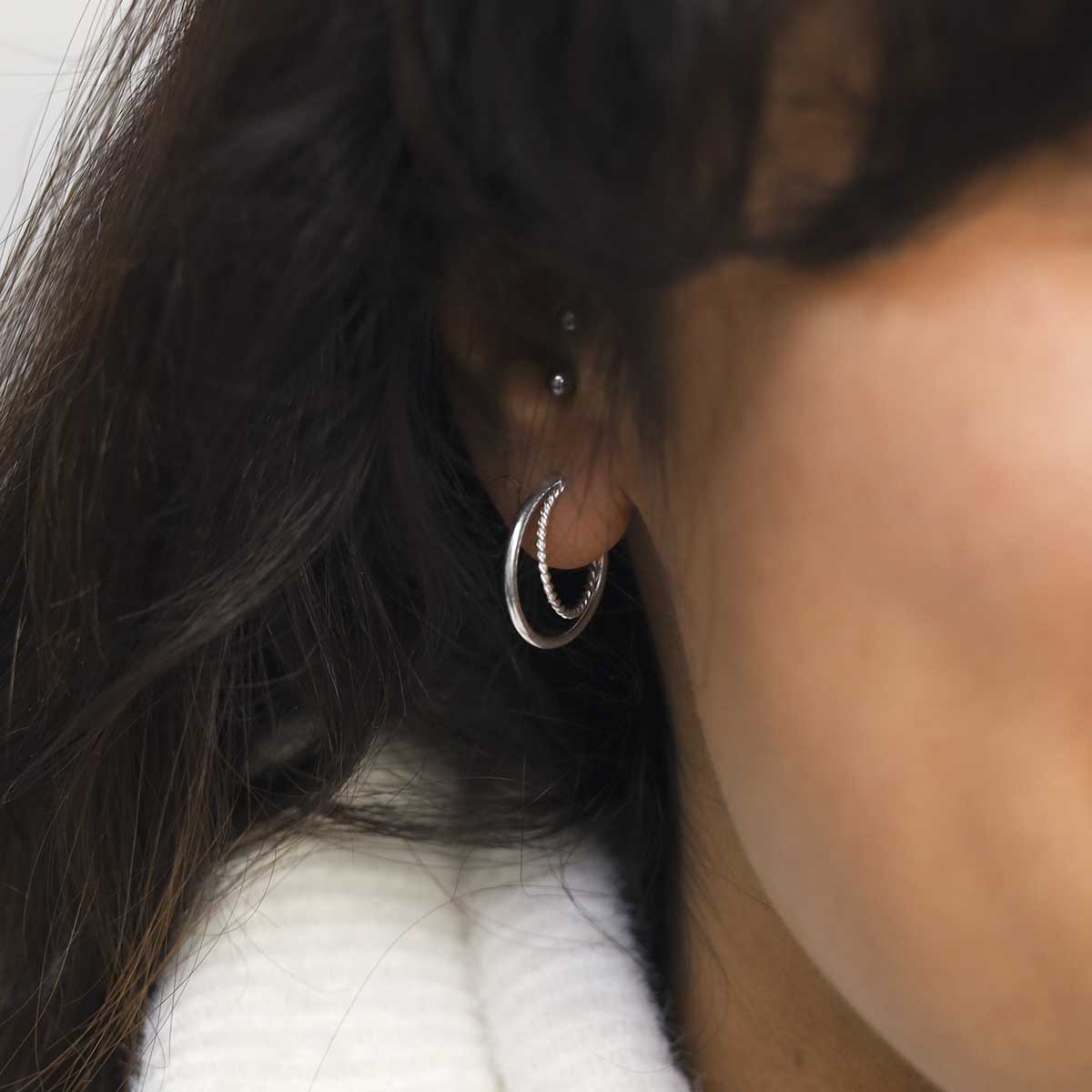 ML744 Sterling Silver Twist and Shout Stud Hoops Model