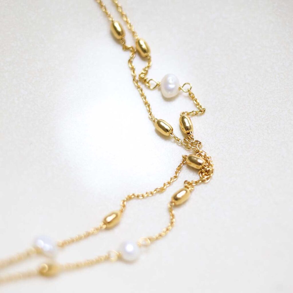 Sterling Silver Gold Plated Pearl Necklace/Bracelet on white