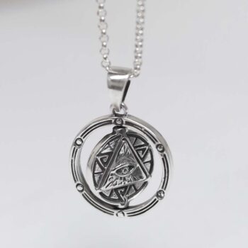 Product photo of sterling silver puzzle pendant on plain background