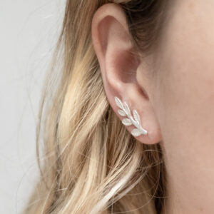 Sterling Silver Leaf Ear Climbers worn by model.