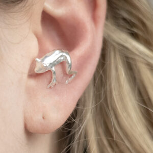Sterling Silver Frog Cuff on a model.