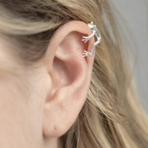 Sterling Silver Frog Cuff on a model.