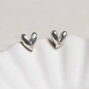 Sterling Silver Love Heart Studs on jewellery dish