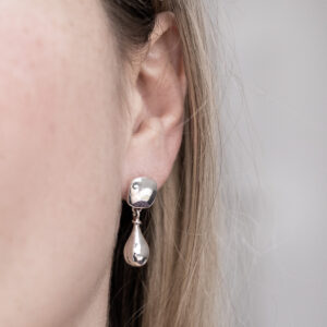 Sterling Silver Rain Droplet Studs worn by a model.