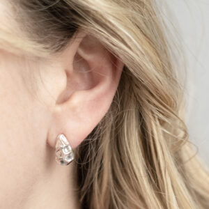 Sterling Silver Molten Drop Studs worn by a model/