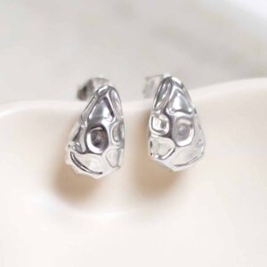 Sterling Silver Molten Drop Studs on jewellery dish