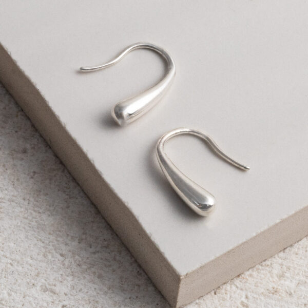 Sterling Silver Mini Liquid Drop Earrings on a white background.