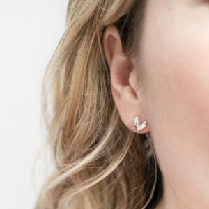 Sterling Silver Love Heart Studs worn by model.
