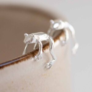 Sterling Silver Frog Cuff wrapped around ceramic