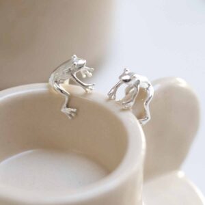 Sterling Silver Frog Cuff wrapped around ceramic