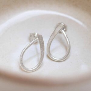 Sterling Silver Ribbon Loop Studs in jewellery dish