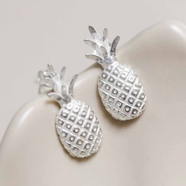 Sterling Silver Pineapple Studs on jewellery dish