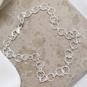 Sterling Silver Shimmer Link Anklet on stone background