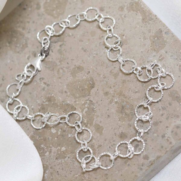 Sterling Silver Shimmer Link Anklet on stone background